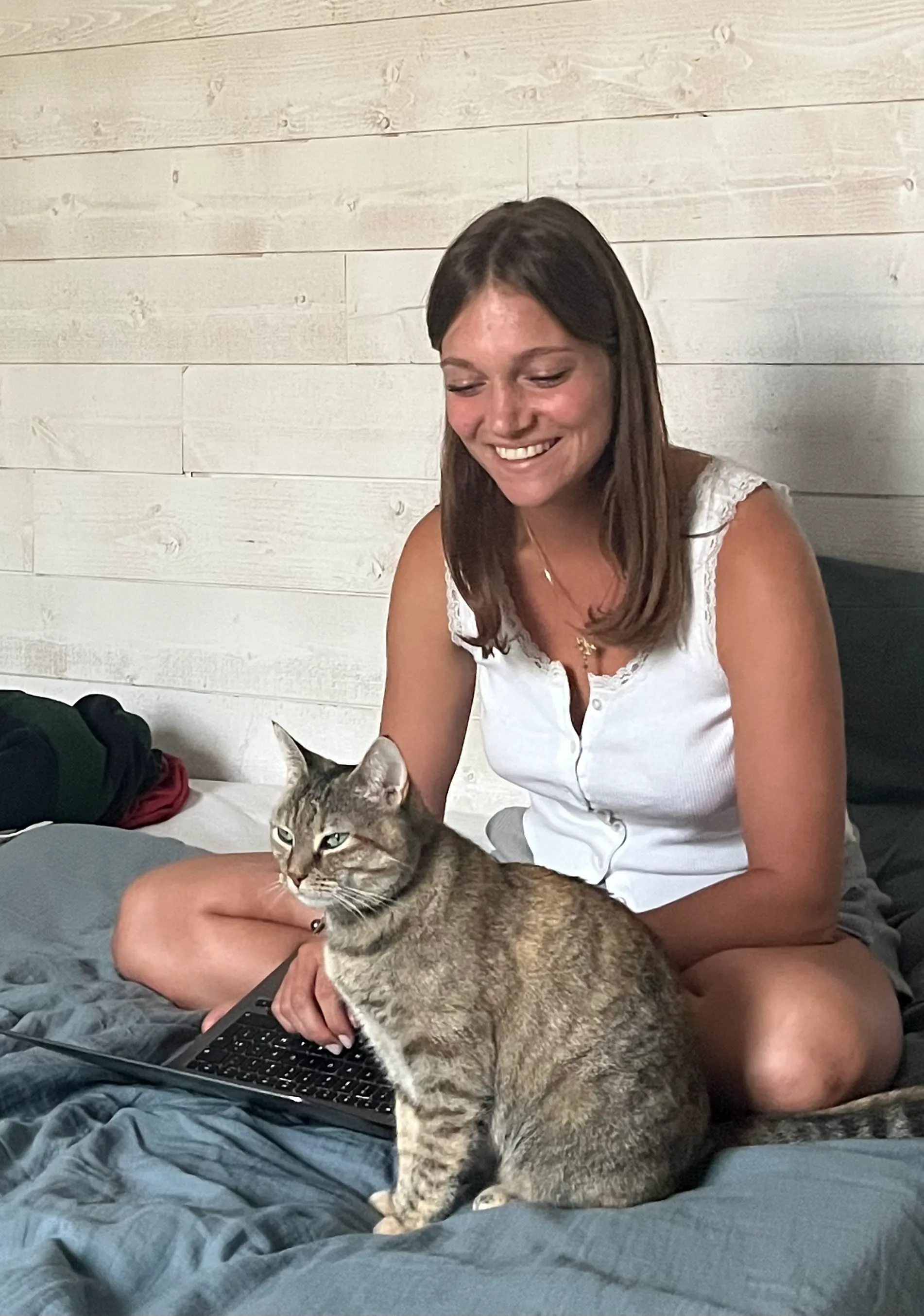 Emily cuddling Mia the cat